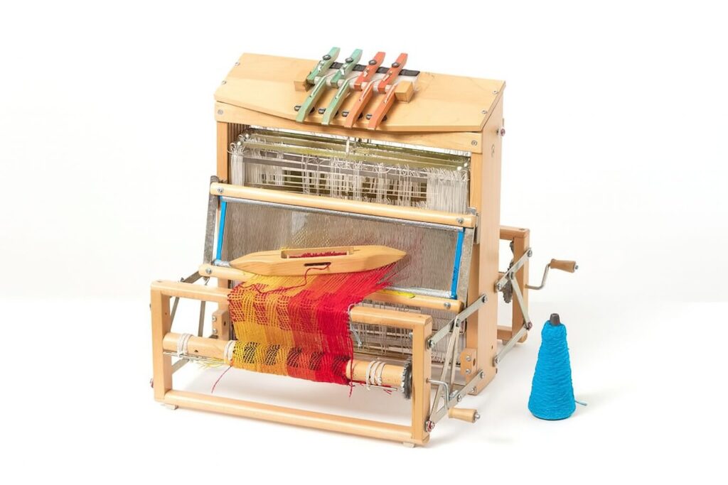 Quais as vantagens de um tear de pente liço?